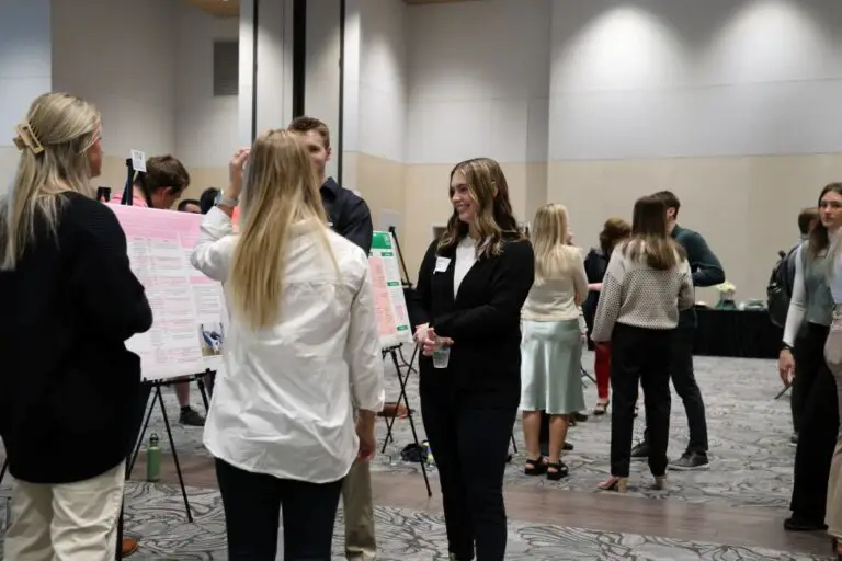 students at poster presentation